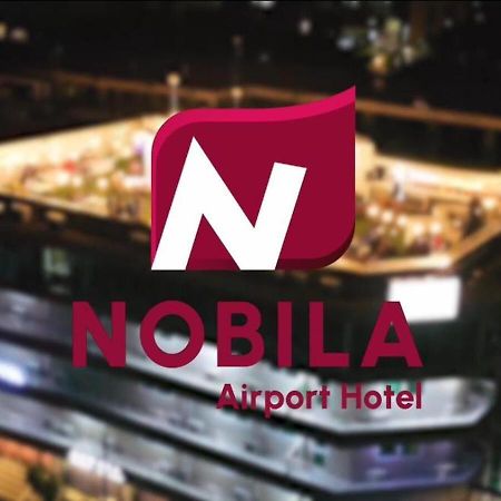 Nobila Airport Hotel Cotonou Extérieur photo